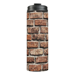 Termo Pared de ladrillo marrón a la luz del día