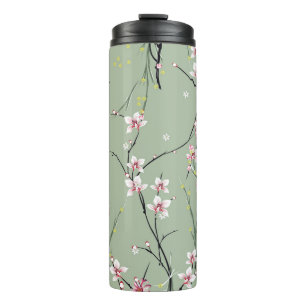 Termo patrón de flores pequeñas rojas y amarillas sobre 