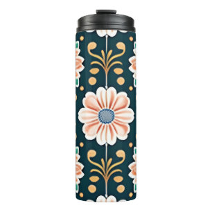 Termo Patrón floral naranja sobre fondo negro