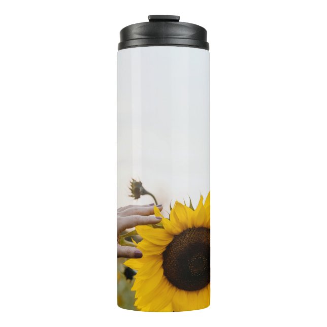 Termo Persona sosteniendo girasol (Anverso)