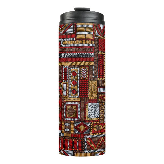 Termo Seamless pattern in patchwork style. Embroidered E (Anverso)
