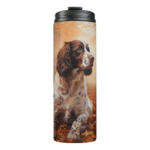 Termo Springer Spaniel en otoño inspira caída de hojas