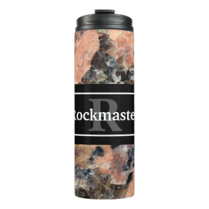 Termo Textura de roca granítica rosa con nombre y monogr