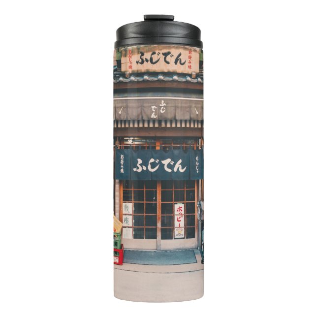 TERMO TRES BICICLETAS ESTACIONADAS FRENTE AL EDIFICIO (Anverso)