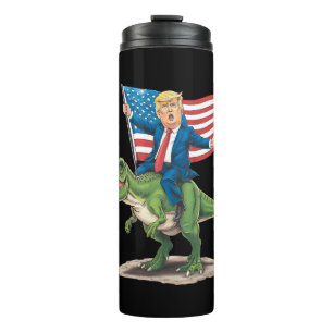Termo Trump montando dinosaurio T Rex USA bandera americ