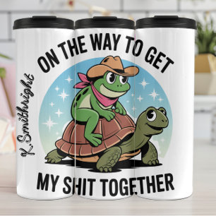 Termo Una rana y una tortuga con humor