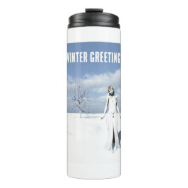 Termo Winter Greetings. Female elf walking in the snow