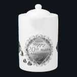 Tetera 2 fotos 20 aniversario Boda emblema platino<br><div class="desc">¿Buscando ese original y único gráfico,  el 20 aniversario del boda les diseñó tetera de porcelana? Entonces esto podría ser todo. obras de arte originales,  gráficos de porcelana y emblema plateado en esta tetera blanca increíblemente impresa. También les gustará disfrutarlo todo el año :)</div>