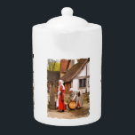 TETERA ANTIGUO INGLATERRA<br><div class="desc">Dos señoras de Tudor limpiando los tubos junto a la bomba de agua. Inglaterra Reino Unido.</div>