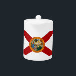 Tetera Bandera del estado de Florida<br><div class="desc">Disfruta de viajar por Florida. A todos les encanta viajar. Personalmente, me encantaría viajar a los 50 estados y explorar otros países. Como soy de Estados Unidos, trataré de obtener lo mejor de cada estado. Luego añadir desde lugares como Europa y el bajo completaría esta tienda. Si tienes prisa y...</div>