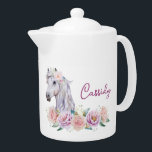 Tetera Caballo Floral de cuento de hadas con nombre<br><div class="desc">Poniente blanco bellamente pintado a mano con una decoración de cabeza floral,  rodeado de un ramo de flores rosas y moradas. Edite fácilmente el nombre. Caballo Floral de cuento de hadas con tetera de nombre.</div>