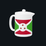 Tetera con bandera de Burundi<br><div class="desc">¡Añada un toque de orgullo burundiano a su hora de tomar el té con nuestra exclusiva tetera con la bandera de Burundi! Esta tetera, elaborada con meticulosa atención a los detalles, es más que un simple artículo de cocina funcional; es una celebración del legado y orgullo cultural de Burundi. El...</div>