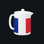 Tetera de la Bandera Francesa<br><div class="desc">Disfrute de su experiencia en el té con nuestra exclusiva tetera con la bandera de Francia. Esta tetera, elaborada con meticulosa atención a los detalles, no es sólo un elemento funcional; es una celebración de la cultura y el patrimonio francés. El diseño vibrante destaca la emblemática bandera francesa, haciendo de...</div>