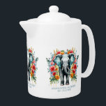 Tetera Elefante floral colorido<br><div class="desc">elefante gris con decoración de flores de colores.</div>