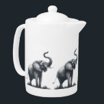 Tetera Elefante majestuoso con tronco levantado<br><div class="desc">Celebra la belleza y el poder de la naturaleza con este encantador diseño que presenta un elefante majestuoso con su baúl alto —un símbolo universal de fuerza, sabiduría y buena suerte. Ya sea que te gusten los elefantes, disfrutes de las artes de la vida salvaje o simplemente quieras darle una...</div>