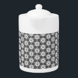 Tetera Floral gris, negro y blanco<br><div class="desc">Tetera de patrón floral blanco,  gris y negro</div>