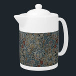 Tetera Flores de época William Morris Golden Lily<br><div class="desc">Este diseño incorpora una hermosa impresión de "Golden Lily", un diseño de papel pintado creado por John Henry Dearle (1859-1932) y producido por Morris & Company, un fabricante y minorista de arte decorativo y de mobiliario, fundado por el artista y diseñador William Morris (1834-1896). Dearle fue un diseñador textil británico...</div>