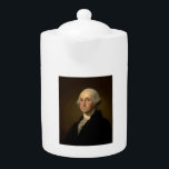 Tetera George Washington Primer presidente norteamericano<br><div class="desc">George Washington, el primer presidente norteamericano de Stuart. El 30 de abril de 1789, George Washington, de pie en el balcón del Federal Hall de Wall Street en Nueva York, prestó juramento como primer Presidente de los Estados Unidos. "Como la primera de todas las cosas, en nuestra situación serviremos para...</div>