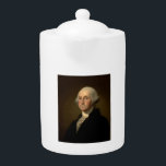 Tetera George Washington Primer presidente norteamericano<br><div class="desc">George Washington, el primer presidente norteamericano de Stuart. El 30 de abril de 1789, George Washington, de pie en el balcón del Federal Hall de Wall Street en Nueva York, prestó juramento como primer Presidente de los Estados Unidos. "Como la primera de todas las cosas, en nuestra situación serviremos para...</div>