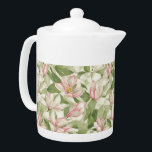 Tetera Magnolias pintadas de rosa y blanco<br><div class="desc">Hermosas flores de magnolia rosa y blanca cubren este estilo que se asemeja a un patrón vintage de papel pintado. El diseño de la casa de campo es muy dulce y romántico,  perfecto para cualquier decoración.</div>