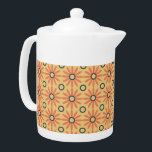 Tetera Naranja retro y patrón de floral de corte negro ab<br><div class="desc">Son lúgubres y divertidas las palabras que se nos vienen a la mente cuando nos fijamos en este dulce naranja retro y en el negro patrón floral abstracto. Oh tan adorable y super lindo también. Este clásico diseño floral de inspiración margarita se traduce a la perfección en la decoración de...</div>