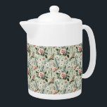 Tetera Patrón Botánico Floral Pastel Vintage<br><div class="desc">Este patrón floral vintage captura la belleza intemporal del ilustracion botánico con un toque suave y romántico. Con delicados rosas de color negro, margaritas blancas, escarabajos y flores silvestres azules, la composición se sitúa en un suave fondo verde que realza el encanto natural de cada flor. La paleta se inclina...</div>
