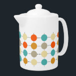 Tetera Patrón retro de los círculos de crema turquesa nar<br><div class="desc">Este colorido y moderno salón de té de mediados de siglo presenta un azul turquesa,  dos tonos de naranja,  crema y círculos de bronceado en una rejilla negra. ¡Añade un poco de diversión a tu hora de té!</div>