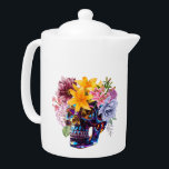 TETERA PETALES DE ESQUÍ<br><div class="desc">Los Pétalos de Calavera es una sorprendente fusión de rebelión vibrante y delicada gracia. Esta obra de arte original presenta un cráneo metálico de alto brillo coronado con flores de estilo vintage — lirios audaces, peonías exuberantes y flores blandas traen contraste y belleza al diseño arriesgado. Ideal para los amantes...</div>