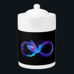 Tetera Símbolo de infinito neón con colibrí brillante<br><div class="desc">Símbolo de infinito violeta y brillante con colibrí azul sobre fondo negro. Neón.</div>