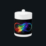 Tetera Símbolo infinito con plumas arcoiris<br><div class="desc">Símbolo de infinito dibujado artísticamente con una hermosa pluma arco iris sobre fondo blanco. Estilo tatuaje.</div>