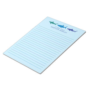 Tiburones azules cortan el Bloc de notas estaciona
