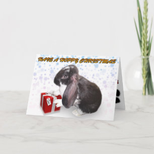 Tiene una tarjeta de Navidades amamantados con una