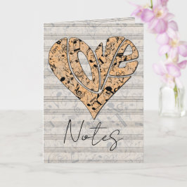 Tipografía de amor en forma de corazón con notas m