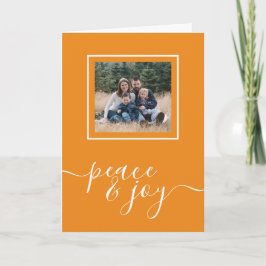 Tipografía de Paz y Alegría de Navidad Foto de Vac