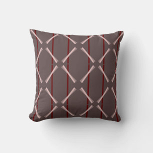 Tirar almohada en tonos de vino.