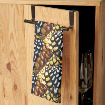 Toalla de cocina amarilla, marrón y negra