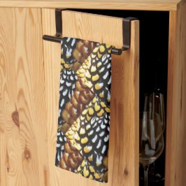 Toalla de cocina amarilla, marrón y negra