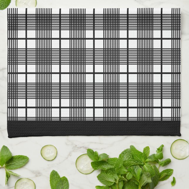 Toalla de cocina con estampado de cuadros negros y (Doblado)