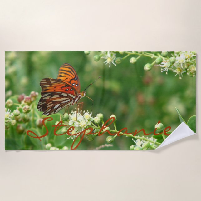 Toalla de playa anaranjada de la mariposa con (Anverso)