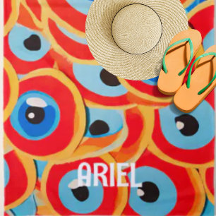 Toalla de playa azul roja colorida de ojos malvado