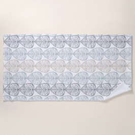 Toalla de playa con adornos abstractos de plantas.