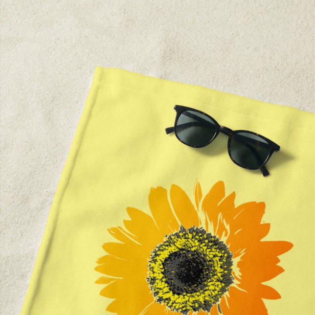 Toalla de playa con diseño de girasoles (In situ)