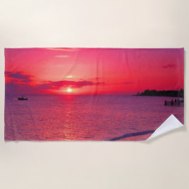 Toalla de playa de puesta de sol oceánica vibrante