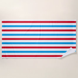 Toalla de playa de rayas rojas, blancas y azules