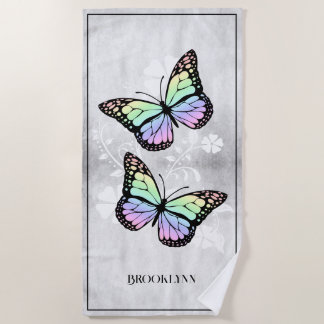 Toalla de playa floral con mariposa arco iris