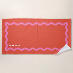 Toalla De Playa Garabato rosa y naranja con texto