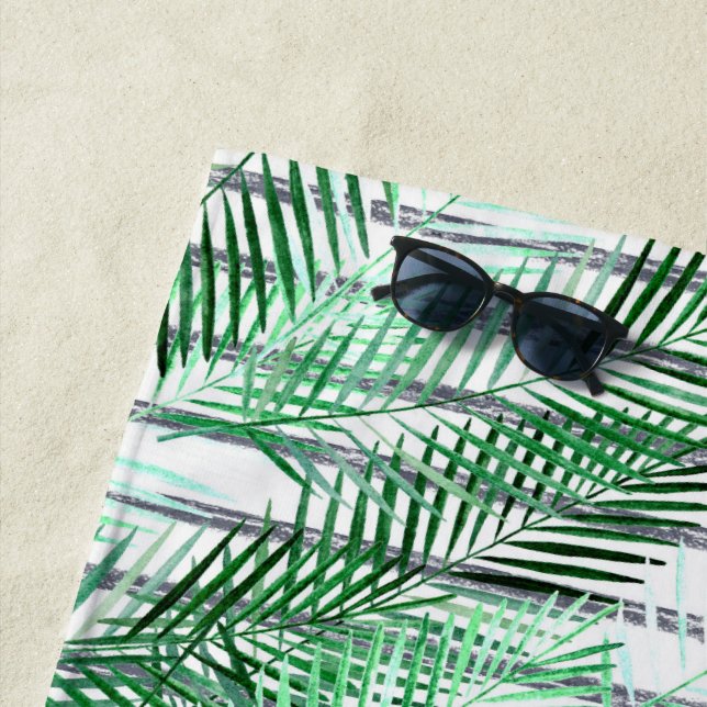 Toalla De Playa Hojas de palma sobre un fondo blanco y negro rayad (In situ)