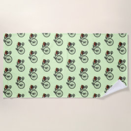 Toalla romántica de playa en bicicleta