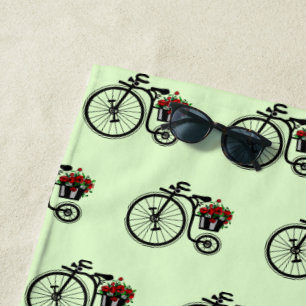 Toalla romántica de playa en bicicleta
