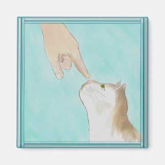 Tocando el imán de la nariz de Kitty